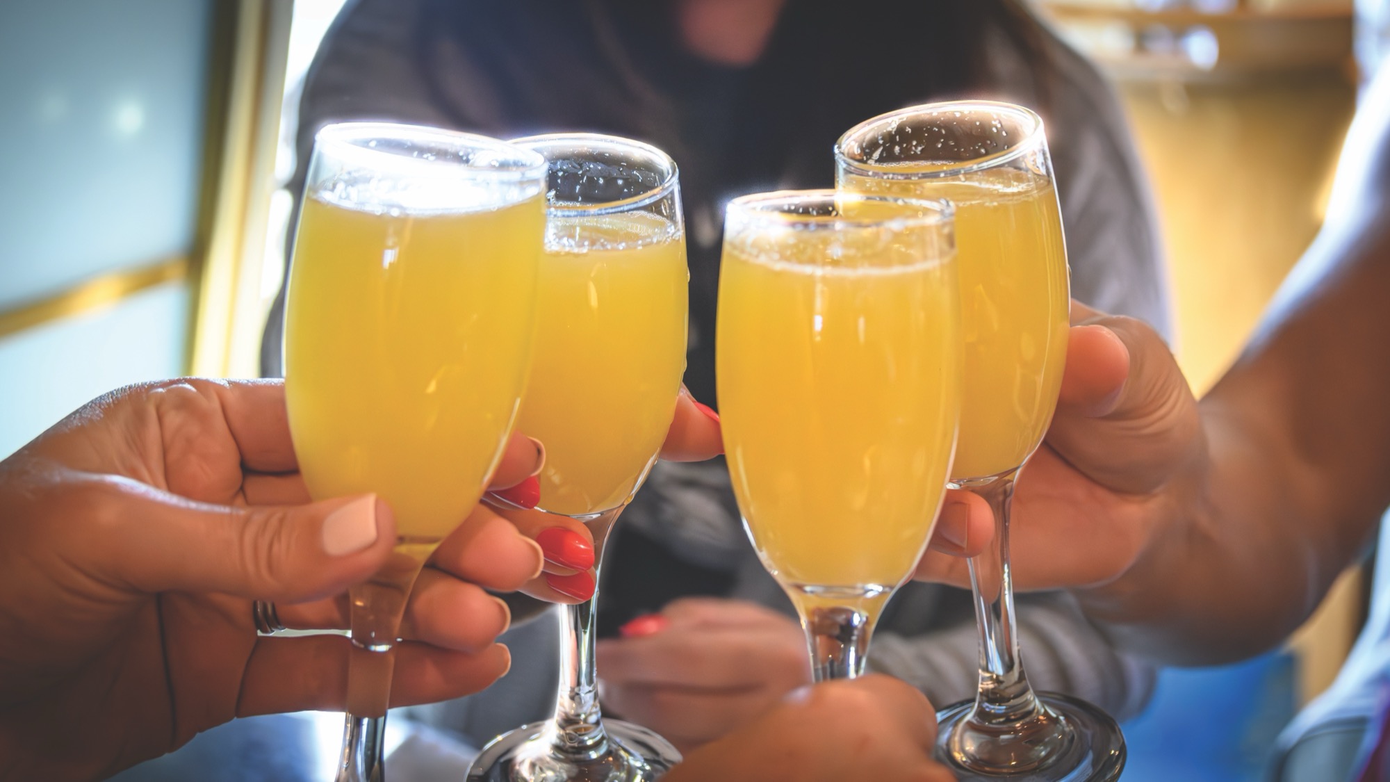 Mimosas at a gay brunch